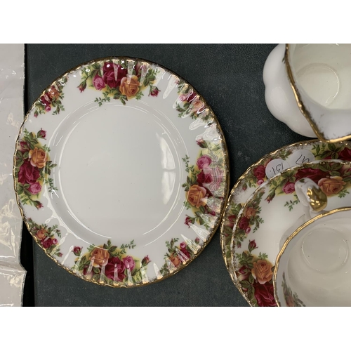 114 - A ROYAL ALBERT 'OLD COUNTRY ROSES' PART TEA SET TO INCLUDE CUPS, SAUCERS, PLATES, A CREAM JUG, SUGAR... 