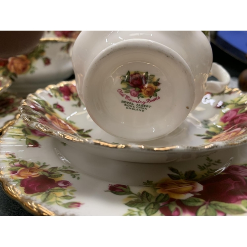 114 - A ROYAL ALBERT 'OLD COUNTRY ROSES' PART TEA SET TO INCLUDE CUPS, SAUCERS, PLATES, A CREAM JUG, SUGAR... 