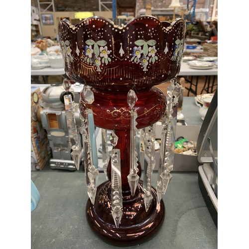 126 - A VICTORIAN CRANBERRY GLASS VASE WITH HANDPAINTED FLORAL DECORATION AND CRYSTAL DROPLETS HEIGHT 36CM