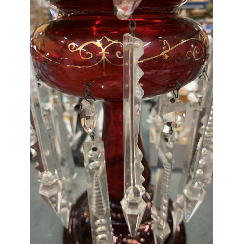 126 - A VICTORIAN CRANBERRY GLASS VASE WITH HANDPAINTED FLORAL DECORATION AND CRYSTAL DROPLETS HEIGHT 36CM