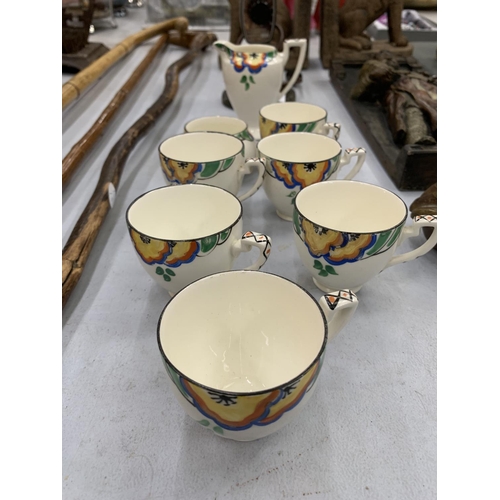 135 - A QUANTITY OF VINTAGE CROWN DUCAL WARE TEAWARE TO INCLUDE 6 CUPS - 1 A/F, A CREAM JUG AND SUGAR BASI... 