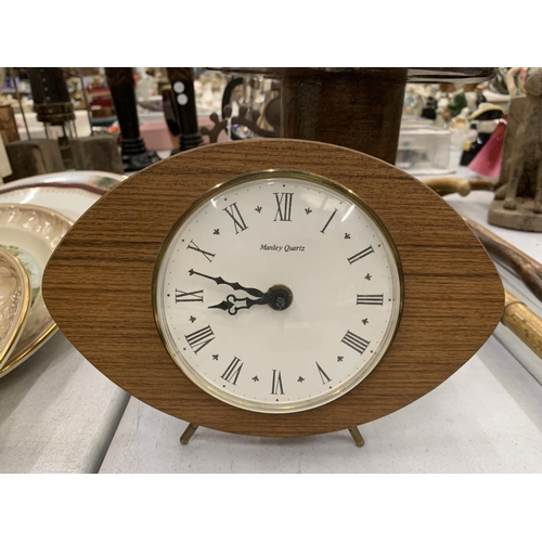 140 - A VINTAGE MAHOGANY RUBBER STAMP STAND HEIGHT APPROX 36CM PLUS A MID CENTURY TEAK MANTLE CLOCK