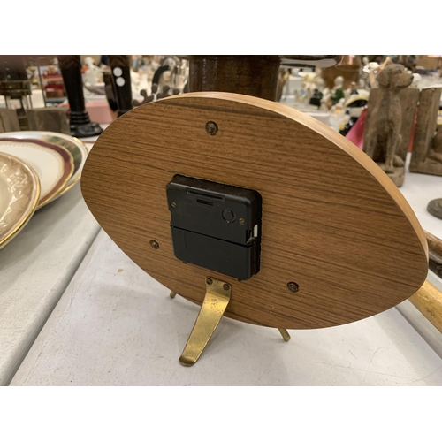 140 - A VINTAGE MAHOGANY RUBBER STAMP STAND HEIGHT APPROX 36CM PLUS A MID CENTURY TEAK MANTLE CLOCK