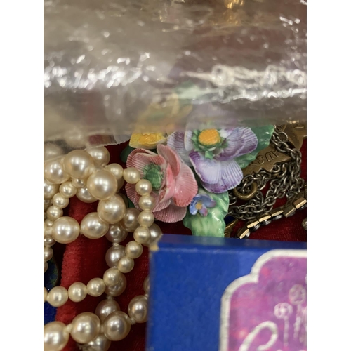 147 - A QUANTITY OF COSTUME JEWELLERY TO INCLUDE BROOCHES, EARRINGS, WATCHES, NECKLACES, BADGES, ETC