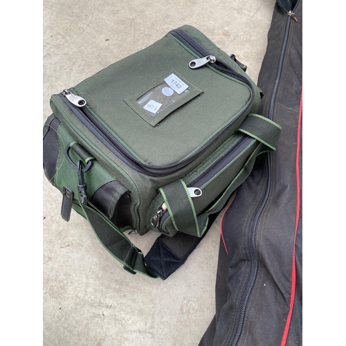 1742 - A TEAM DAIWA FISHING HOLDALL CONTAINING RODS, NETS AND A CAMOFLAGE BROLLY, BANK STICKS, MICROMESH KE... 