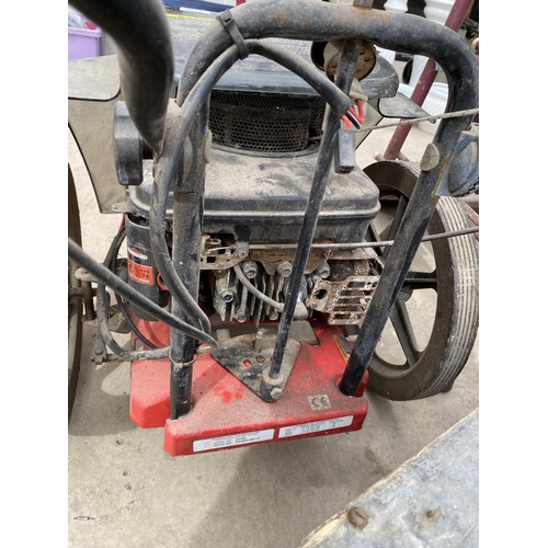 1755 - A TROY-BILT PETROL PUSH ALONG TRIMMER/MOWER