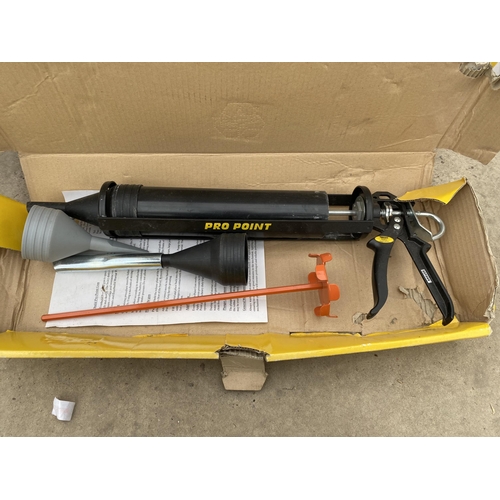 A PRO POINT GUN KIT AND A TILE CUTTER