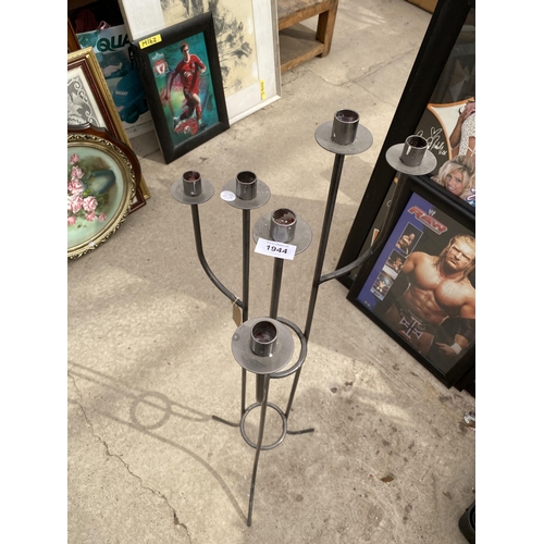 1944 - A TALL METAL SIX BRANCH CANDLE HOLDER