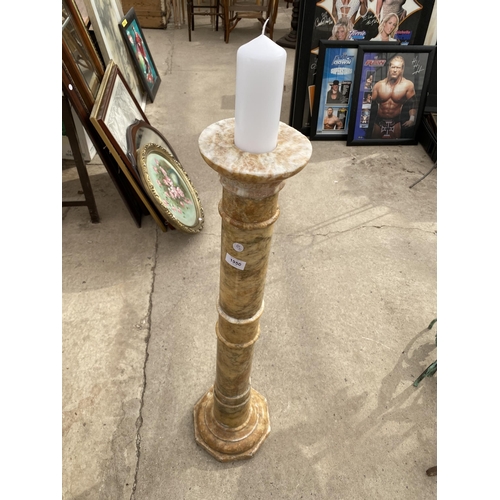 1950 - A TALL DECORATIVE MARBLE CANDLE HOLDER