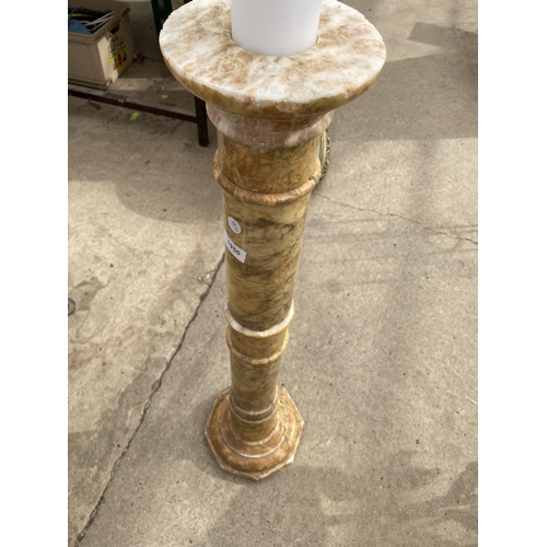 1950 - A TALL DECORATIVE MARBLE CANDLE HOLDER