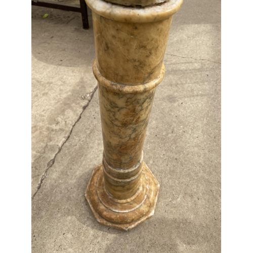 1950 - A TALL DECORATIVE MARBLE CANDLE HOLDER