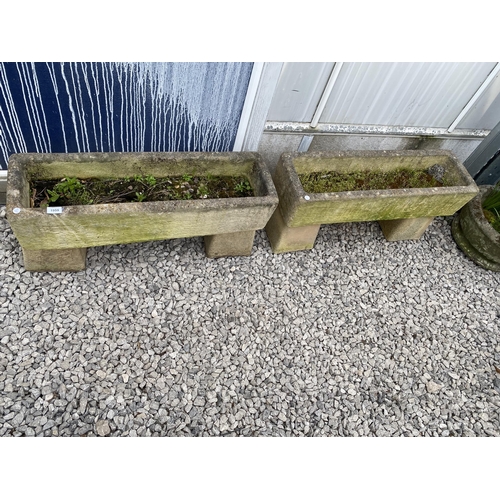 1959 - A PAIR OF RECONSTITUTED STONE TROUGH PLANTERS WITH PEDESTAL BASES