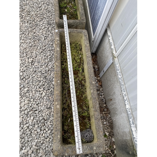 1959 - A PAIR OF RECONSTITUTED STONE TROUGH PLANTERS WITH PEDESTAL BASES