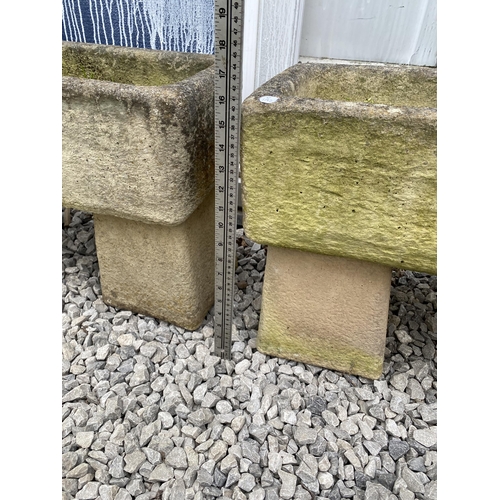 1959 - A PAIR OF RECONSTITUTED STONE TROUGH PLANTERS WITH PEDESTAL BASES