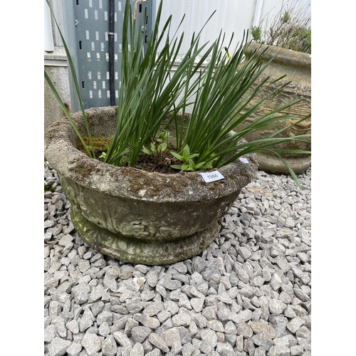 1960 - A ROUND RECONSTITUTED STONE PLANTER