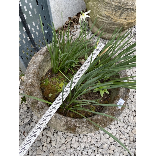 1960 - A ROUND RECONSTITUTED STONE PLANTER