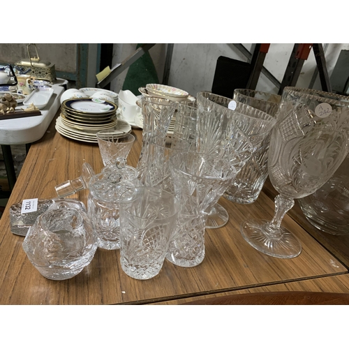 1132 - A QUANTITY OF GLASSWARE TO INCLUDE CUT GLASS VASES, LIDDED POTS, A SWEDISH TEALIGHT HOLDER, OWL PAPE... 