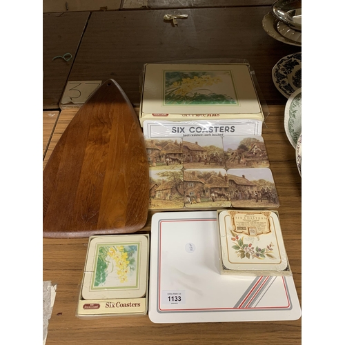 1133 - A QUANTITY OF PLACEMATS AND COASTERS PLUS A WOODEN TRIANGULAR BOARD