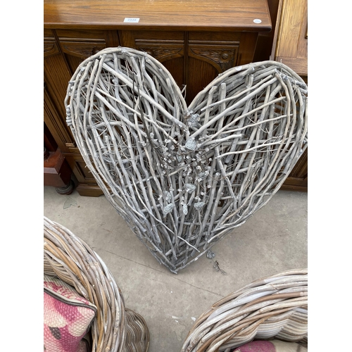 2992 - A PAIR OF WICKER CONSERVATORY CHAIRS AND PAIR OF WICKER HEART SHAPED DECORATIONS