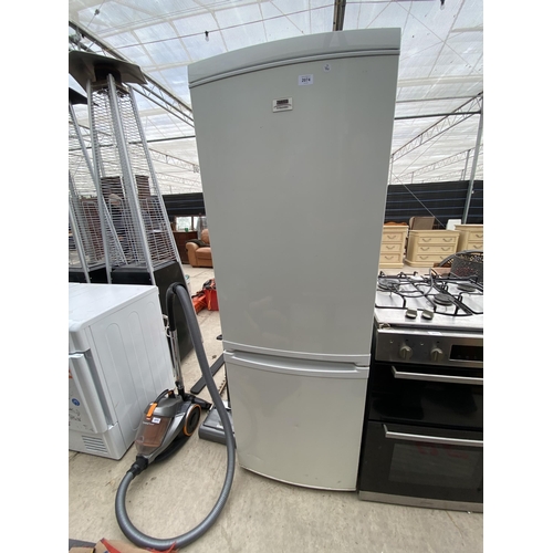 2074 - A WHITE ELECTROLUX UPRIGHT FRIDGE FREEZER