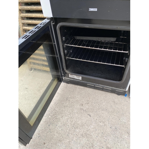 2221 - A WHITE AND BLACK ZANUSSI ELECTRIC OVEN AND HOB