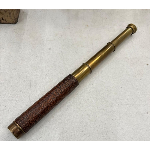 231A - A VINTAGE BRASS AND LEATHER TELESCOPE