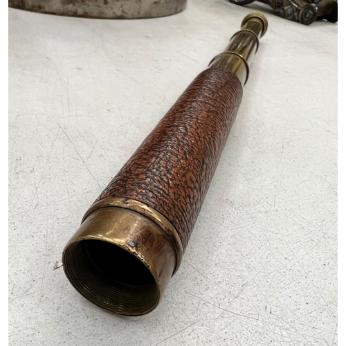 231A - A VINTAGE BRASS AND LEATHER TELESCOPE