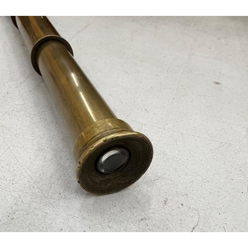 231A - A VINTAGE BRASS AND LEATHER TELESCOPE