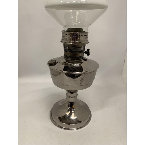 209 - A VINTAGE STAINLESS STEEL EFFECT OIL LAMP