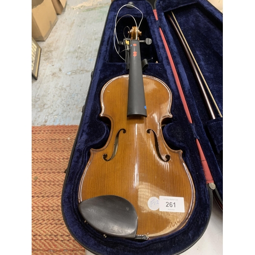 261 - A CASED VIOLIN AND BOW