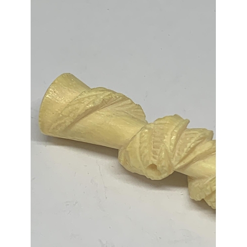 609 - A CARVED BONE CHEROOT HOLDER