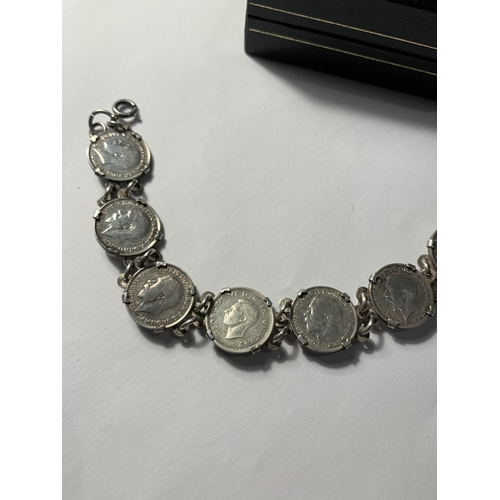 630 - A SILVER JOEY THREE PENCE PIECE BRACELET WITH A PRESENTATION BOX