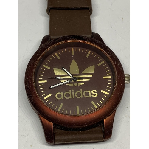 654 - AN ADIDAS WRIST WATCH SEEN WORKING BUT NO WARRANTY