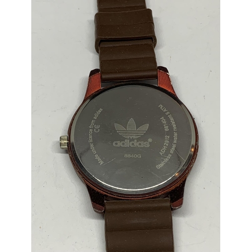 654 - AN ADIDAS WRIST WATCH SEEN WORKING BUT NO WARRANTY