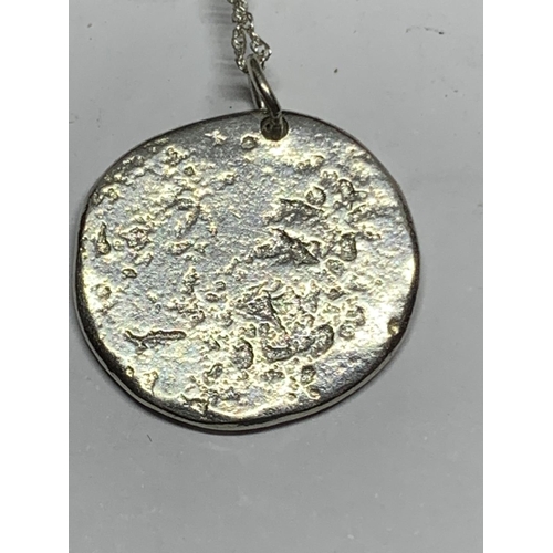 662 - A SILVER NECKLACE WITH ORIENTAL COIN PENDANT IN A PRESENTATION BOX