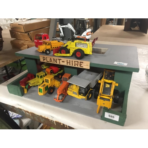 986 - A PLANT HIRE GARAGE WITH TWELVE VARIOUS VEHICLES AND MACHINES