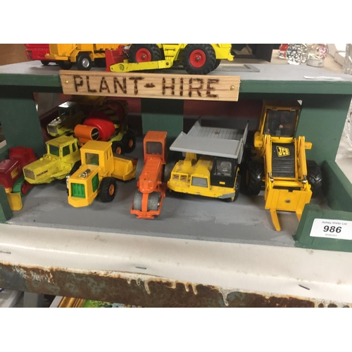 986 - A PLANT HIRE GARAGE WITH TWELVE VARIOUS VEHICLES AND MACHINES