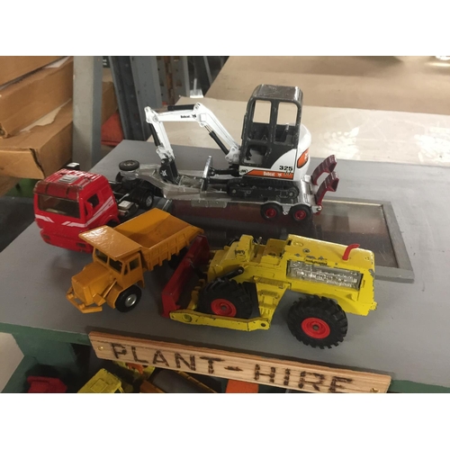 986 - A PLANT HIRE GARAGE WITH TWELVE VARIOUS VEHICLES AND MACHINES