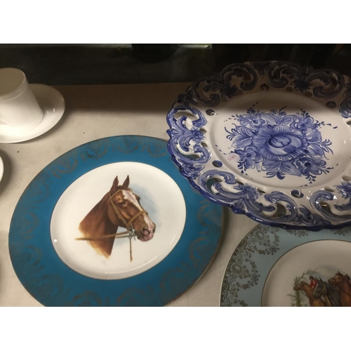 1001 - A LARGE HANDPAINTED BLUE AND WHITE SHALLOW BOWL TOGETHER WITH VARIOUS OTHER PLATES AND A BOSSON OF A... 