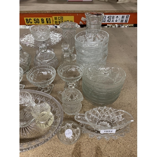 1052 - A LARGE QUANTITY OF GLASSWARE TO INCLUDE VASES, BOWLS, JUGS, ETC