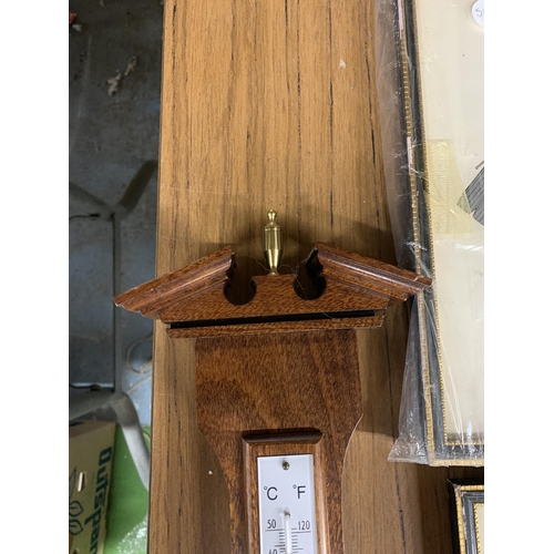 1089 - A WOODEN CASED BAROMETER