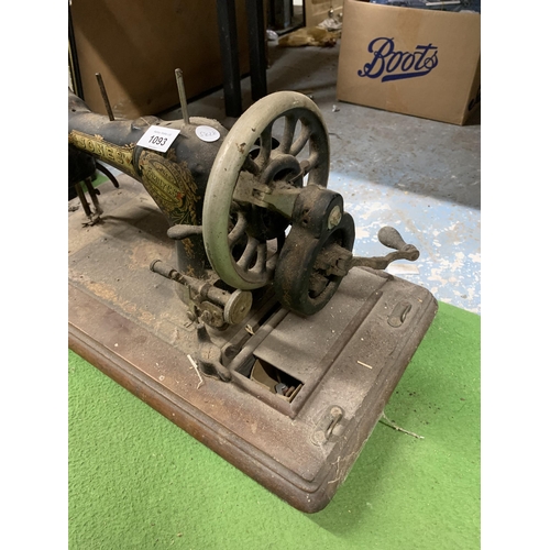 1093 - A VINTAGE HAND TURNED JONES SEWING MACHINE