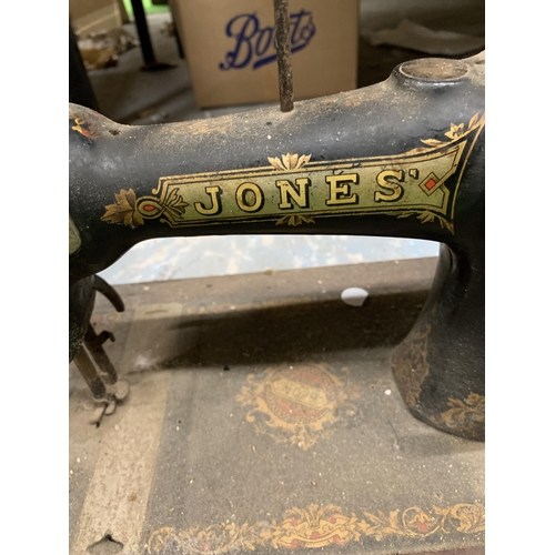 1093 - A VINTAGE HAND TURNED JONES SEWING MACHINE