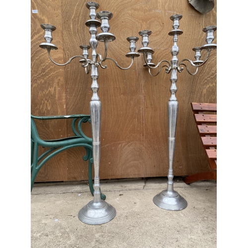 1582 - A PAIR OF LARGE DECORATIVE METAL FOUR BRANCH CANDLE HOLDERS (H:122CM)