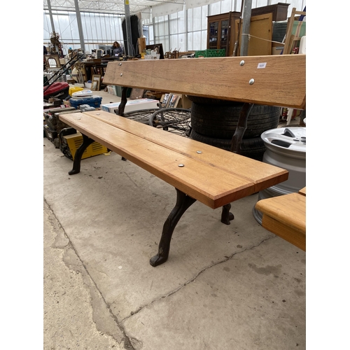 1651 - A LARGE REFURBISHED WOODEN SLATTED BENCH WITH 'KNOTTY' CAST IRON BENCH ENDS