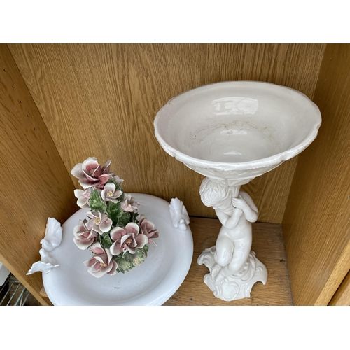 1705 - THREE CERAMIC PIECES TO INCLUDE A WHITE BOWL WITH BIRD DETAIL AND A CHERUB HOLDIUNG A BOWL ETC