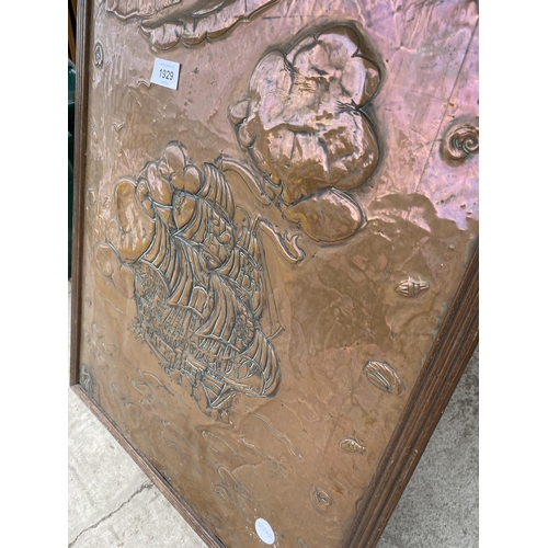 1929 - A DECORATIVE WOODEN FRAMED COPPER EMBOSSED WALL HANGING OF A SHIP