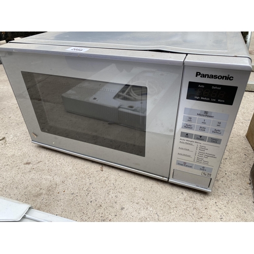 2088 - A SILVER PANASONIC MICROWAVE OVEN