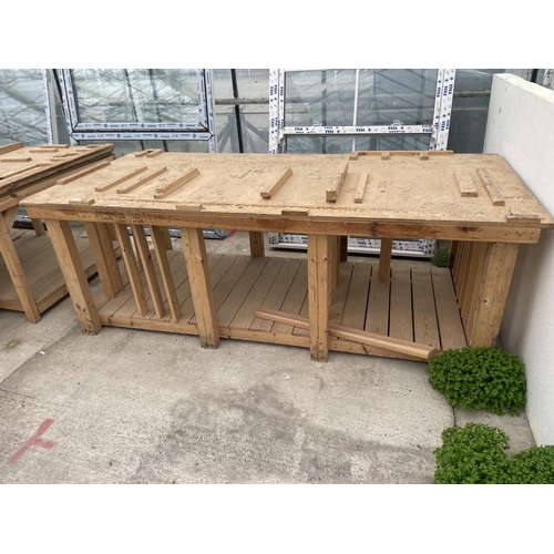 2307 - A LARGE WOODEN WORK BENCH