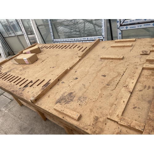 2308 - A LARGE WOODEN WORK BENCH